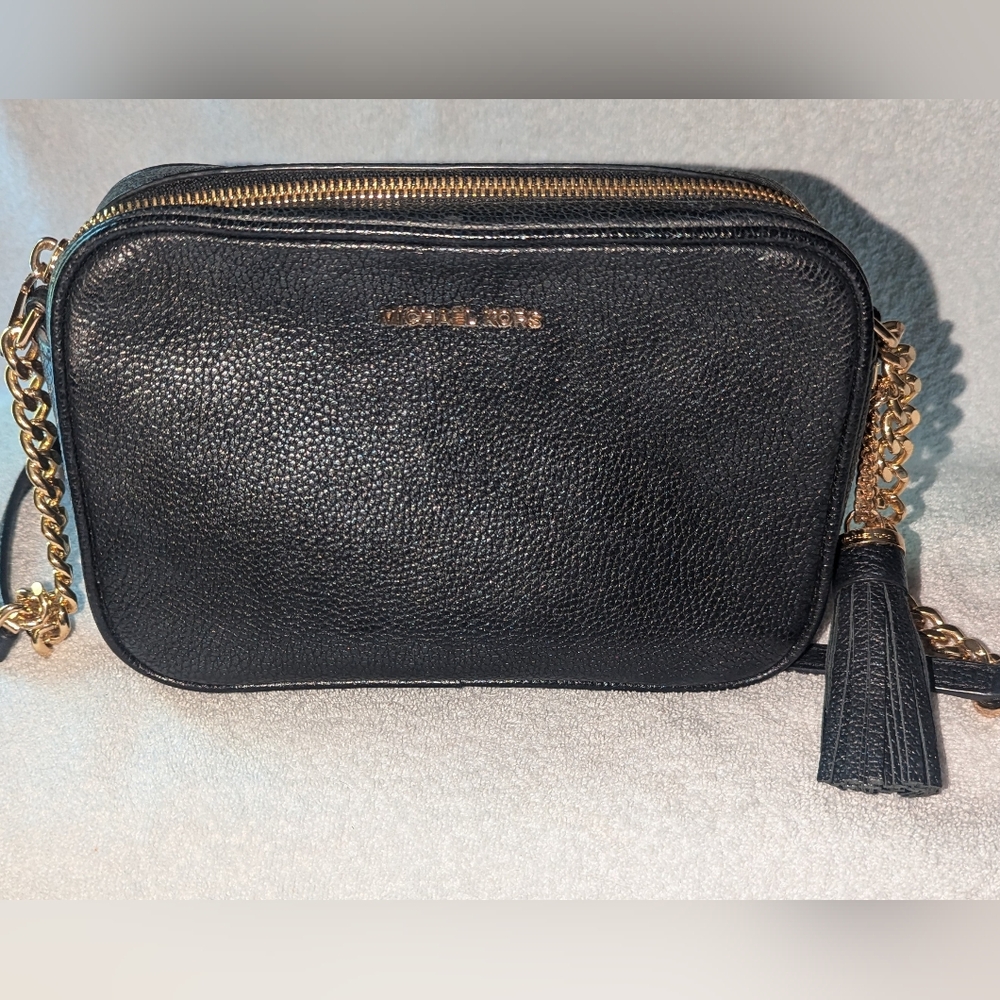 Michael Kors Jet Set black leather camera bag.